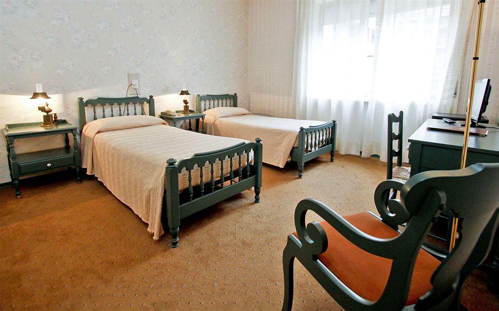 Hotel Antares Arona Bagian luar foto