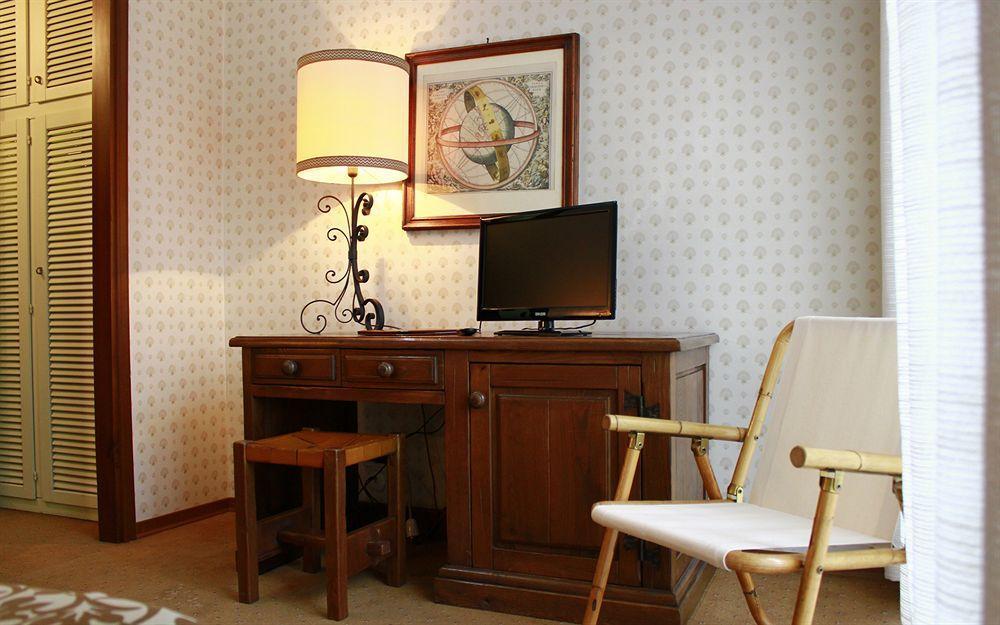 Hotel Antares Arona Bagian luar foto
