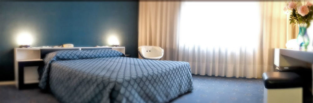 Hotel Antares Arona Bagian luar foto